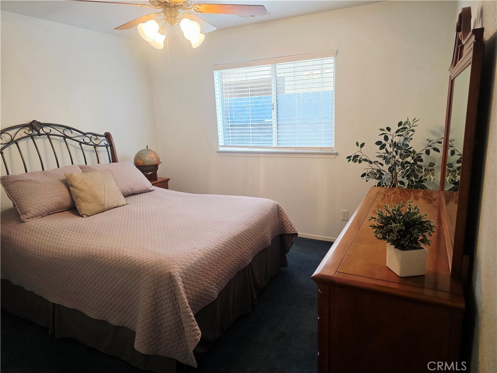 1618 Charlie Lane Santa Maria, CA 93454 - Photo 34 of 57 a bedroom with a bed and a window