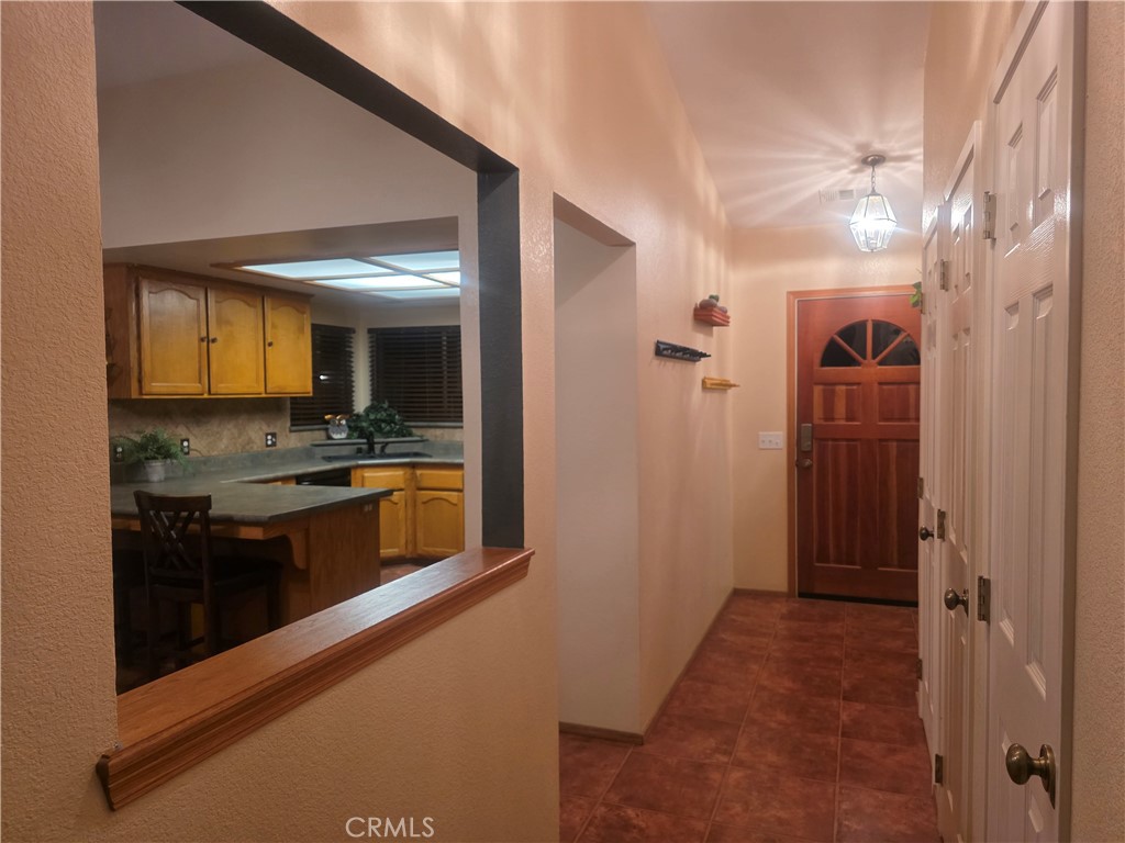 1618 Charlie Lane Santa Maria, CA 93454 - Photo 42 of 57 a view of a kitchen from the hallway