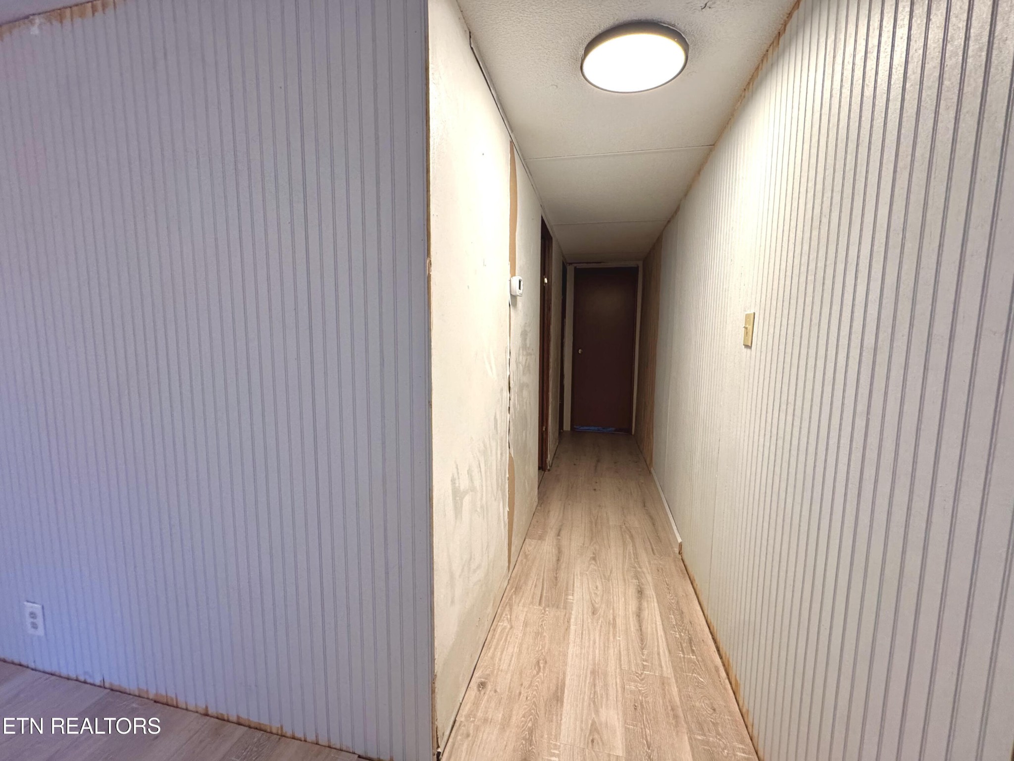 2654 Holt Town Road Newport, TN 37821 - Photo 9 of 24 a view of a hallway with wooden floor