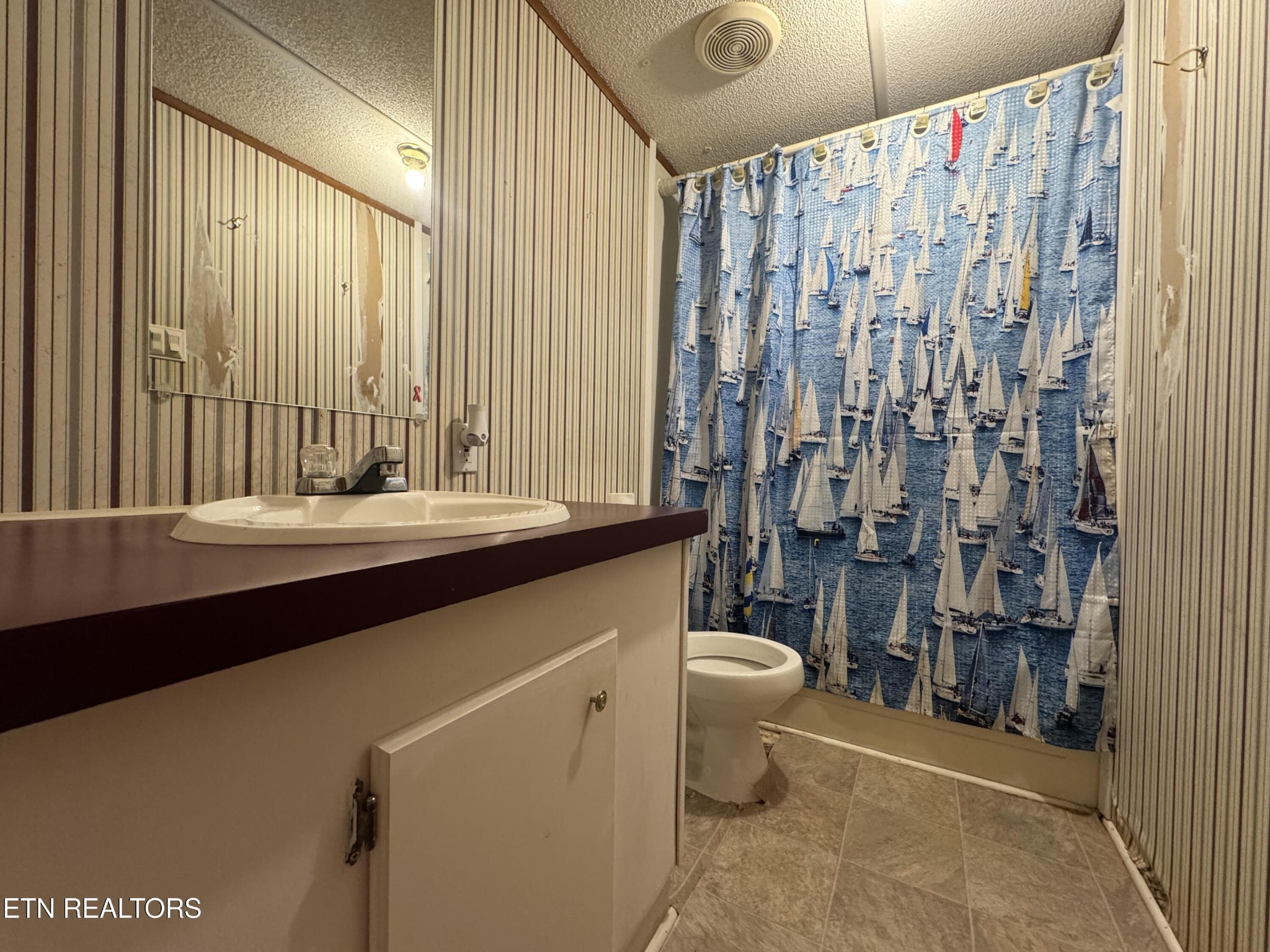 2654 Holt Town Road Newport, TN 37821 - Photo 10 of 24 a bathroom with a sink and a mirror