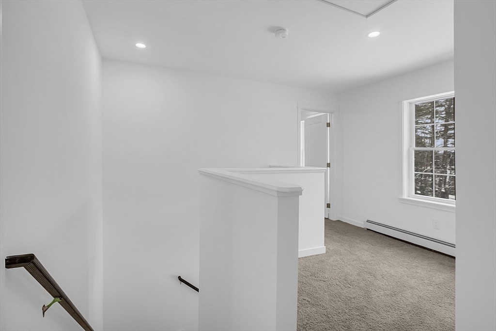 823 Carpenter Road Athol, MA 01331 - Photo 18 of 41 a view of an empty room with a window