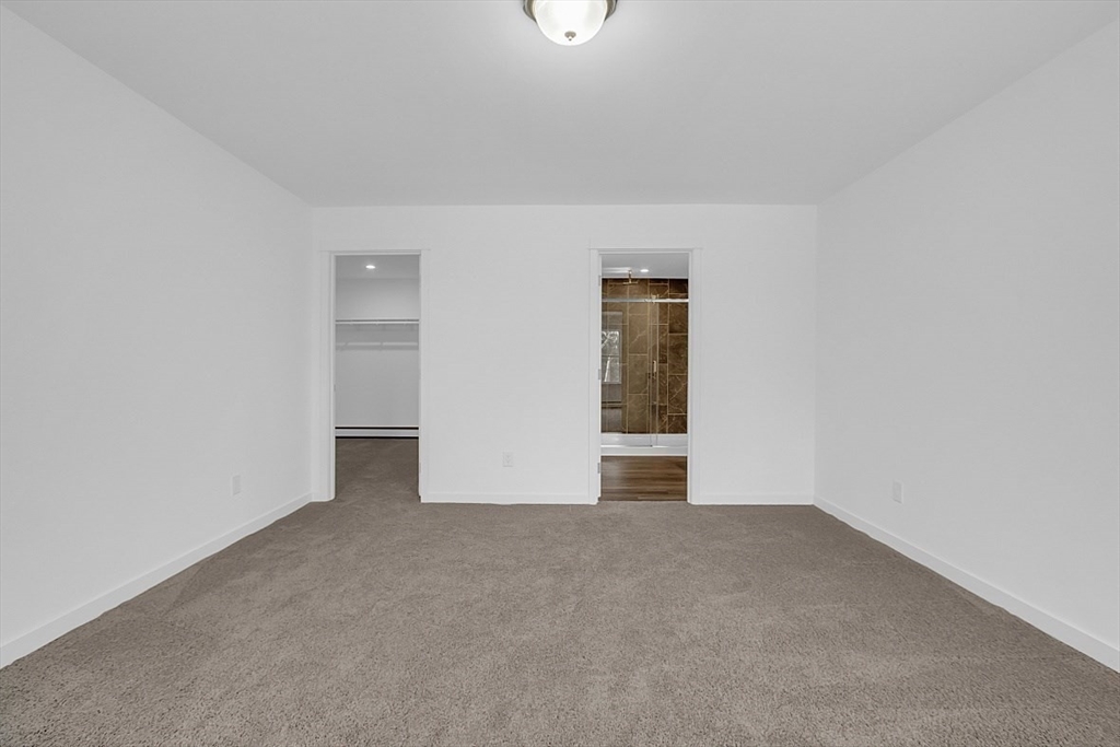 823 Carpenter Road Athol, MA 01331 - Photo 20 of 41 a view of an empty room with a window
