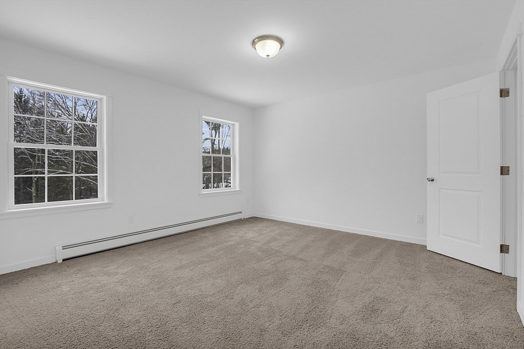 823 Carpenter Road Athol, MA 01331 - Photo 24 of 41 an empty room with windows