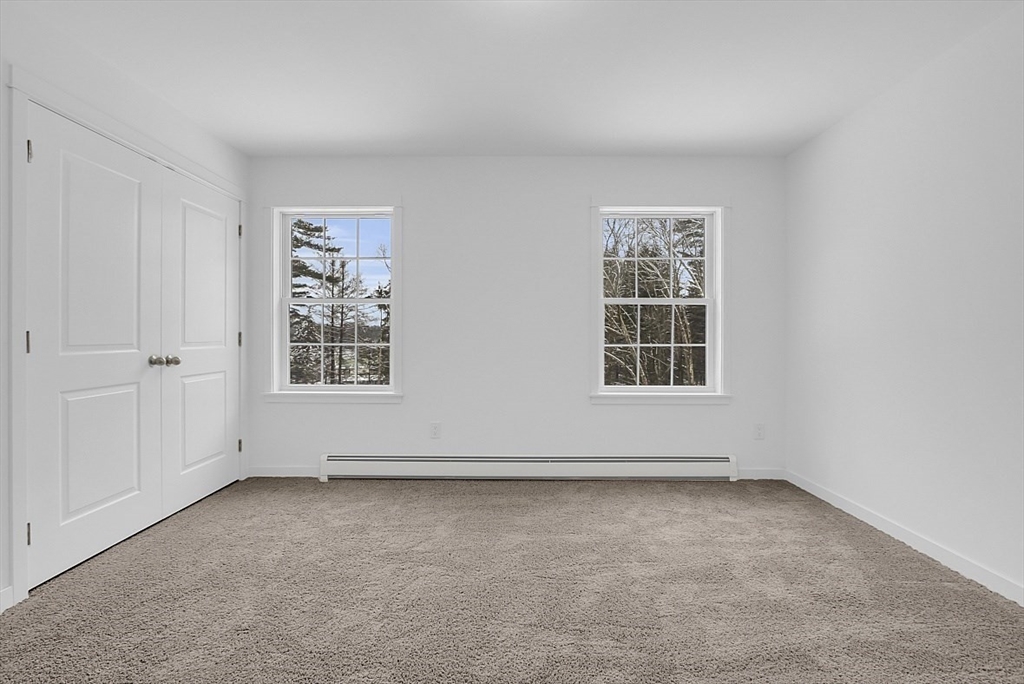 823 Carpenter Road Athol, MA 01331 - Photo 25 of 41 an empty room with windows
