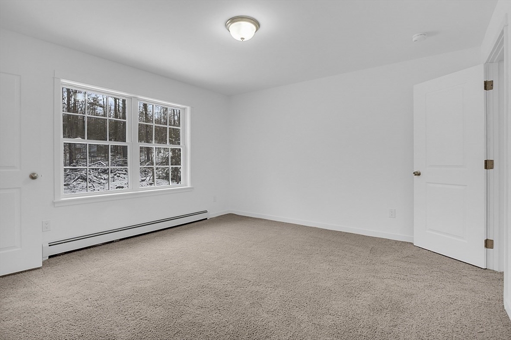 823 Carpenter Road Athol, MA 01331 - Photo 28 of 41 an empty room with windows