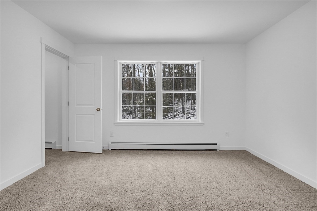 823 Carpenter Road Athol, MA 01331 - Photo 29 of 41 an empty room with a window