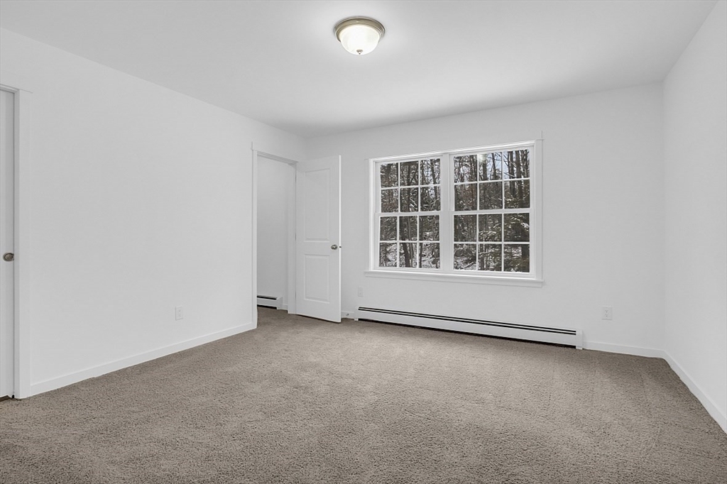 823 Carpenter Road Athol, MA 01331 - Photo 30 of 41 an empty room with windows