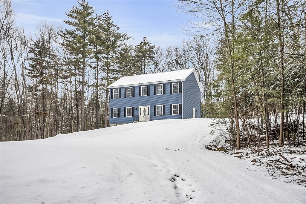 823 Carpenter Road Athol, MA 01331 - Photo 3 of 41 a view of a house with a snow in the yard