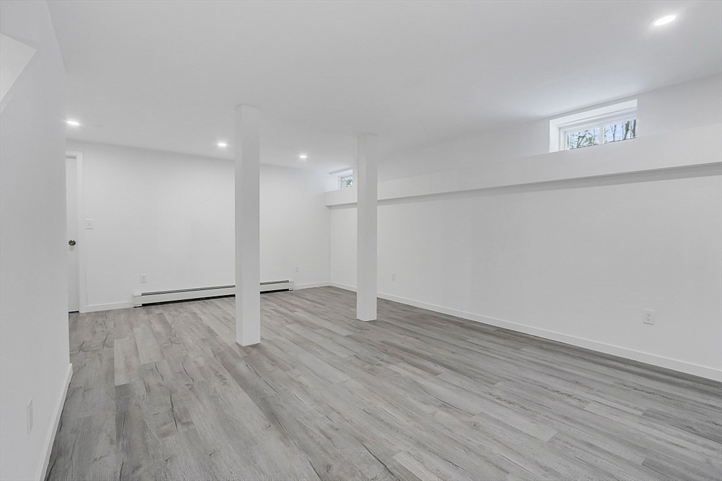 823 Carpenter Road Athol, MA 01331 - Photo 32 of 41 a view of an empty room with wooden floor