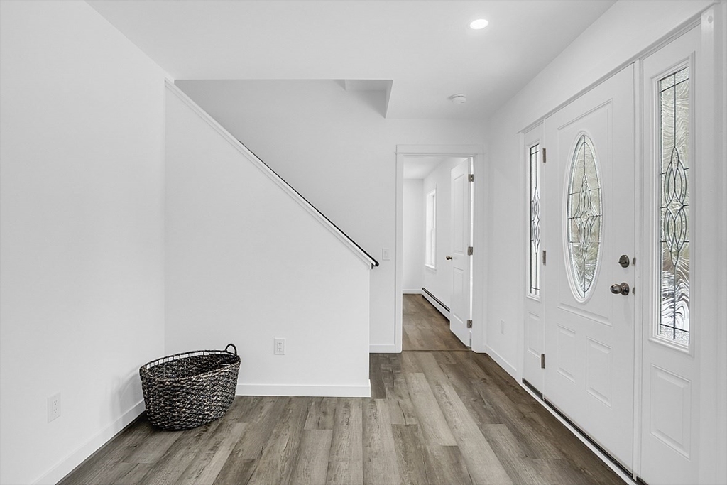 823 Carpenter Road Athol, MA 01331 - Photo 5 of 41 a view of front door with wooden floor