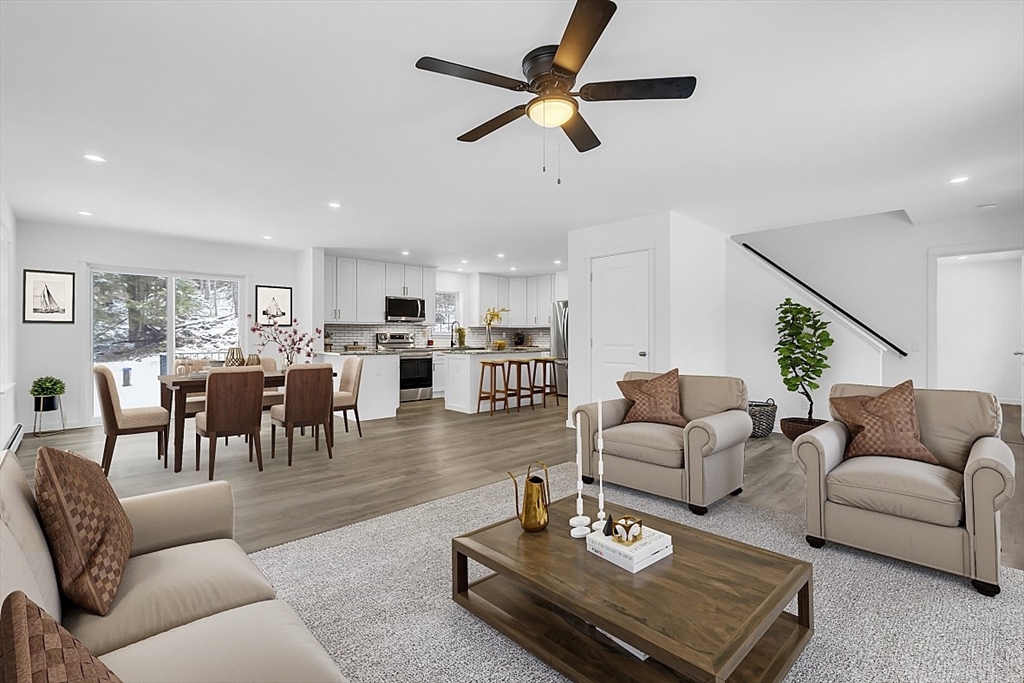 823 Carpenter Road Athol, MA 01331 - Photo 6 of 41 a living room with furniture kitchen view and a chandelier