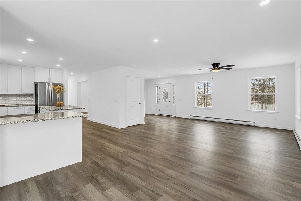 823 Carpenter Road Athol, MA 01331 - Photo 9 of 41 a view of kitchen with furniture and wooden floor