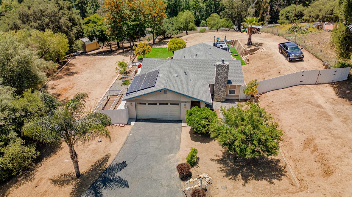 3263 Green Canyon Road Fallbrook, CA 92028 - Photo 1 of 1 an aerial view of a house with a yard and lake view