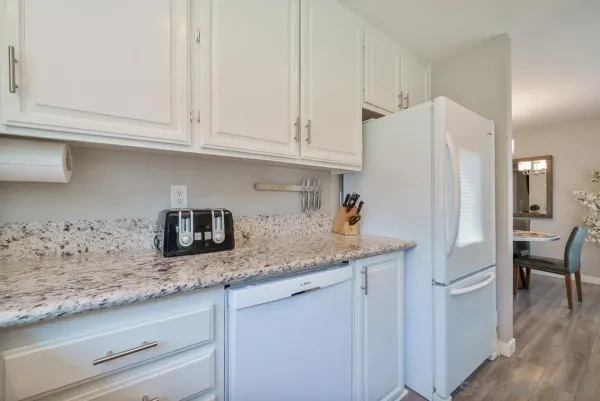 a kitchen with a stove and a microwave