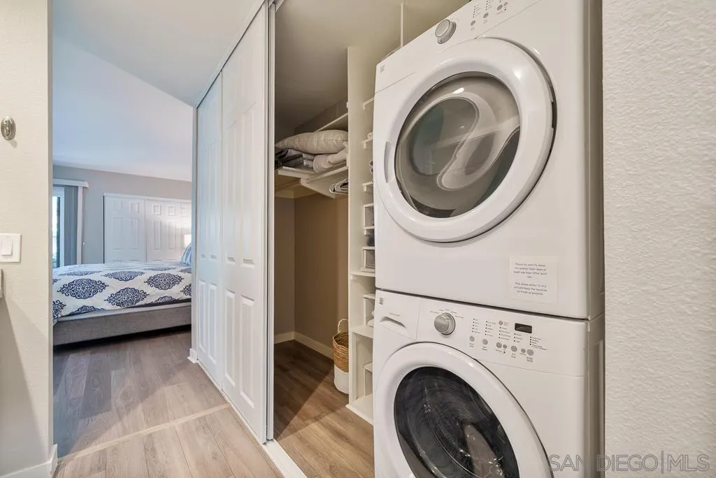 17637 Pomerado Road, Unit 123 San Diego, CA 92128 - Photo 24 of 61 a view of a bedroom with washer and dryer