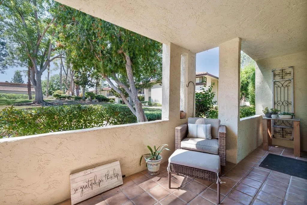 17637 Pomerado Road, Unit 123 San Diego, CA 92128 - Photo 33 of 61 a living room with furniture and a large window