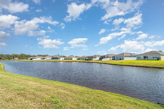 a view of an ocean and city