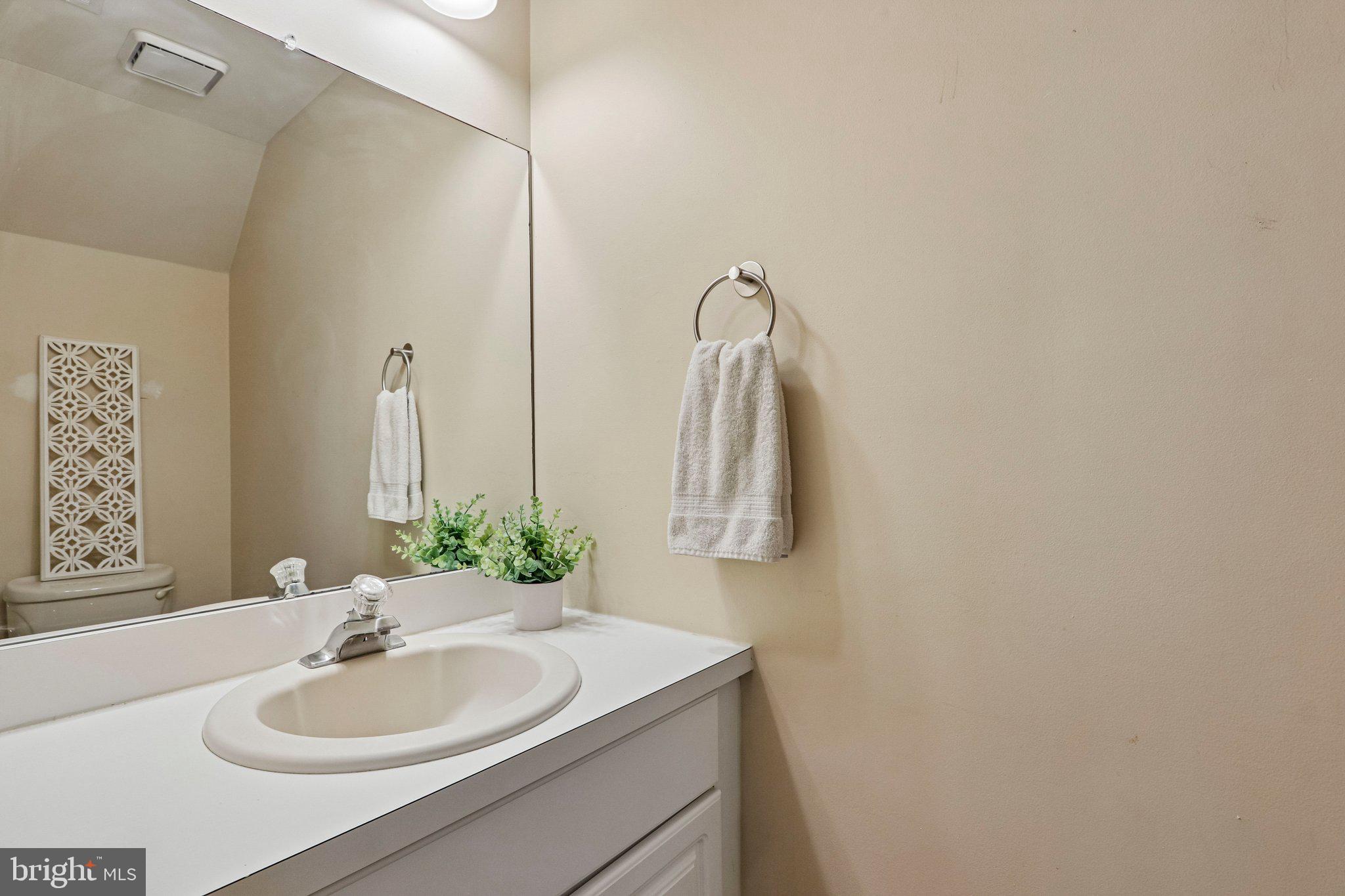 803 Wharton Road Mount Laurel, NJ 08054 - Photo 16 of 48 a bathroom with a sink and a mirror