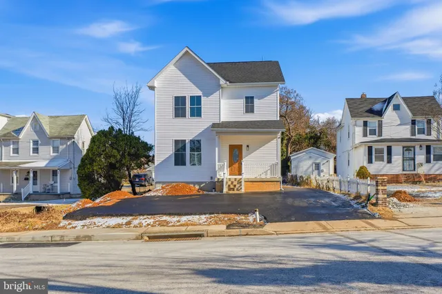 a front view of a building with street view