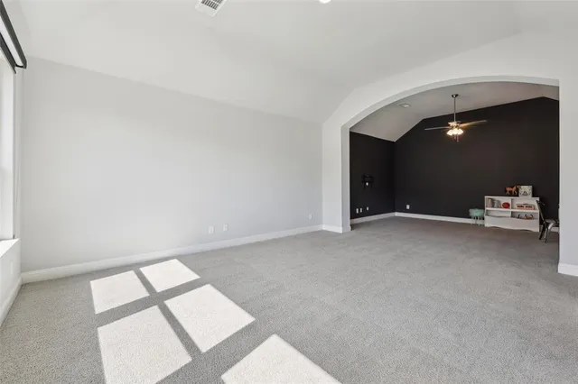 a view of livingroom with furniture and window