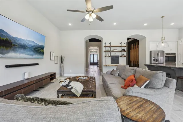 a living room with furniture and a rug
