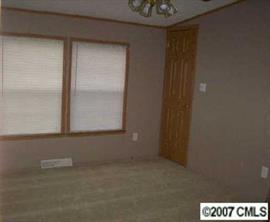2515 Hinson Road Monroe, NC 28112 - Photo 6 of 8 a bathroom with a window