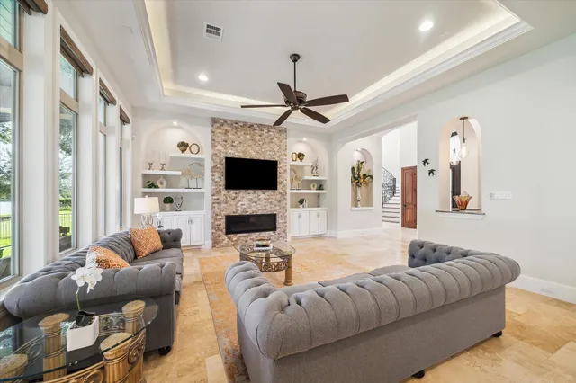 a kitchen with a sink appliances and cabinets