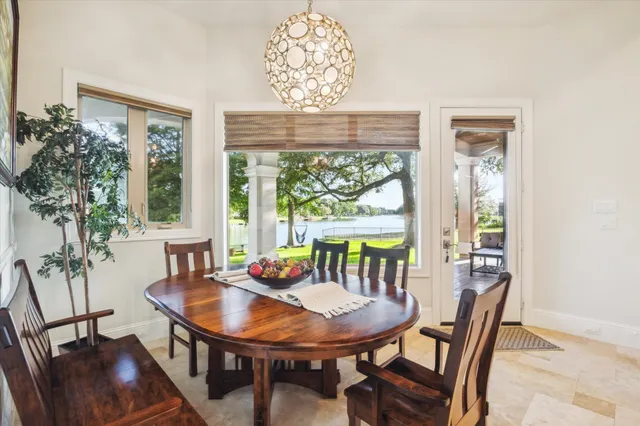 a spacious bedroom with a large bed and windows