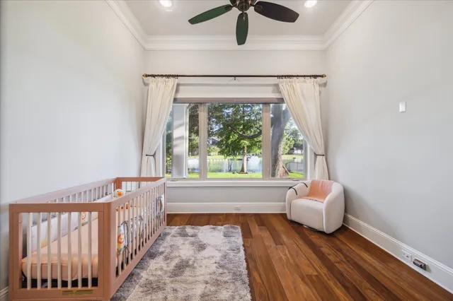 a bathroom with a granite countertop toilet a sink a mirror and shower