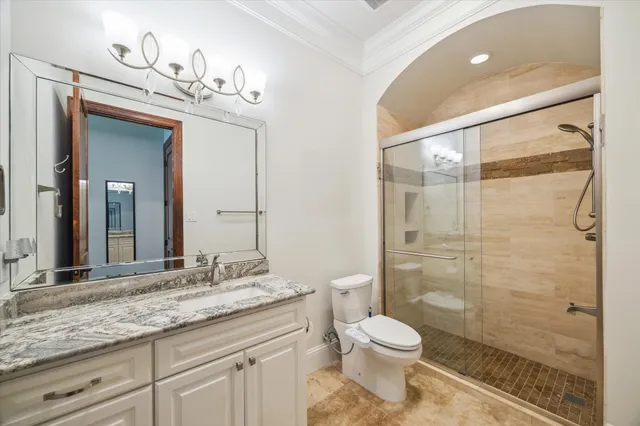 a living room with furniture and a book shelf
