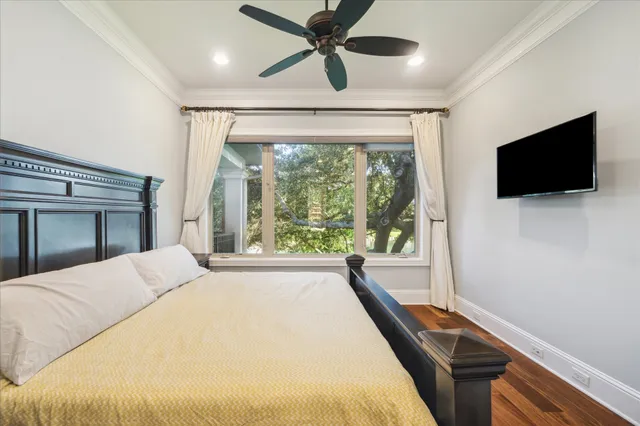 a bathroom with a granite countertop sink toilet mirror and shower