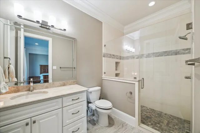 a bedroom with two beds and a window