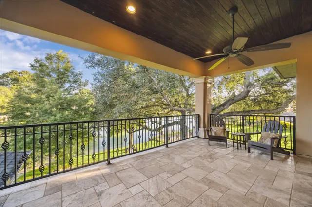 a building outdoor space with patio furniture and garden