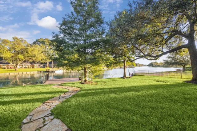 a view of a balcony with wooden floor