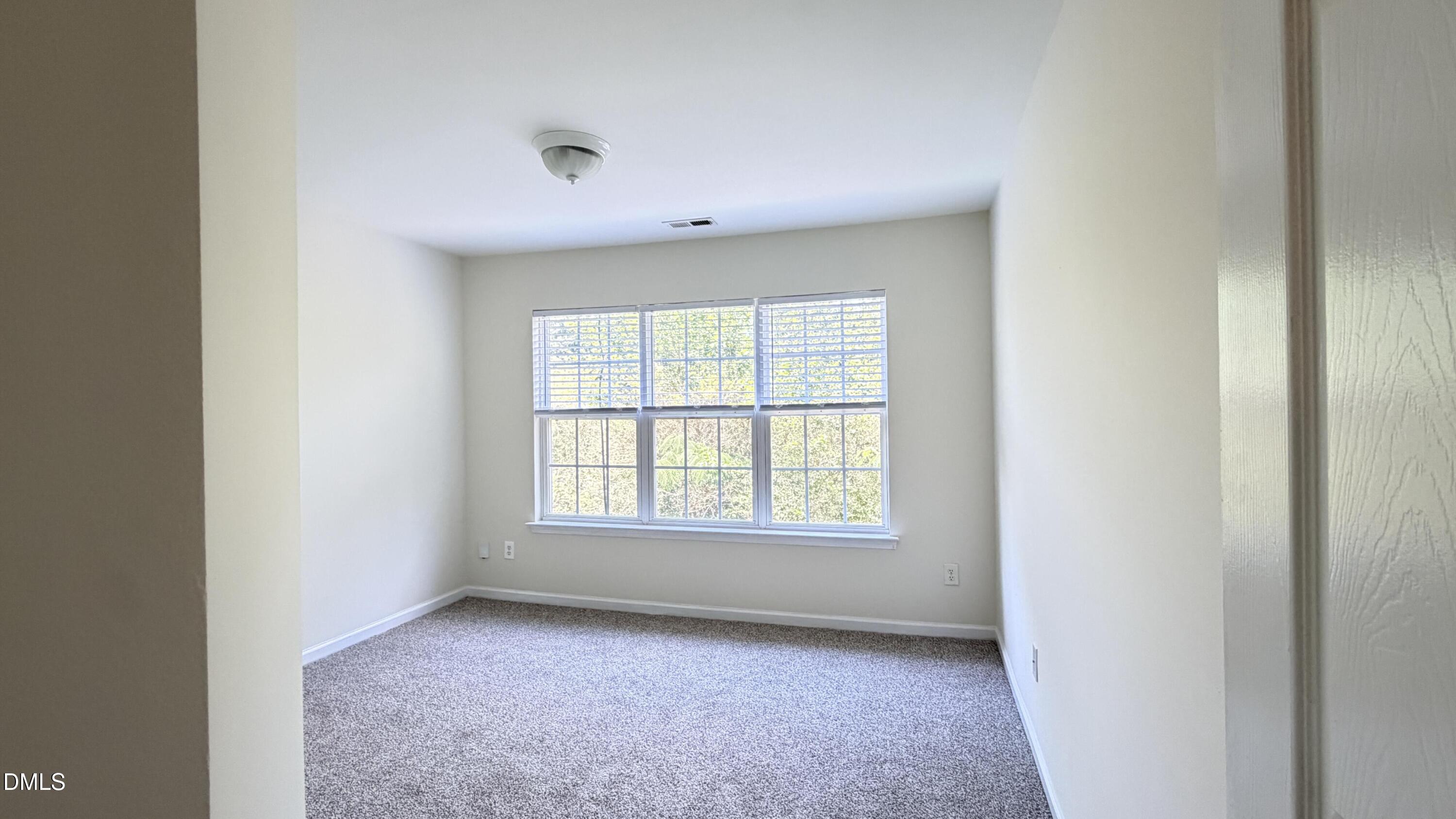 4123 Standing Rock Way Raleigh, NC 27604 - Photo 22 of 29 an empty room with a window
