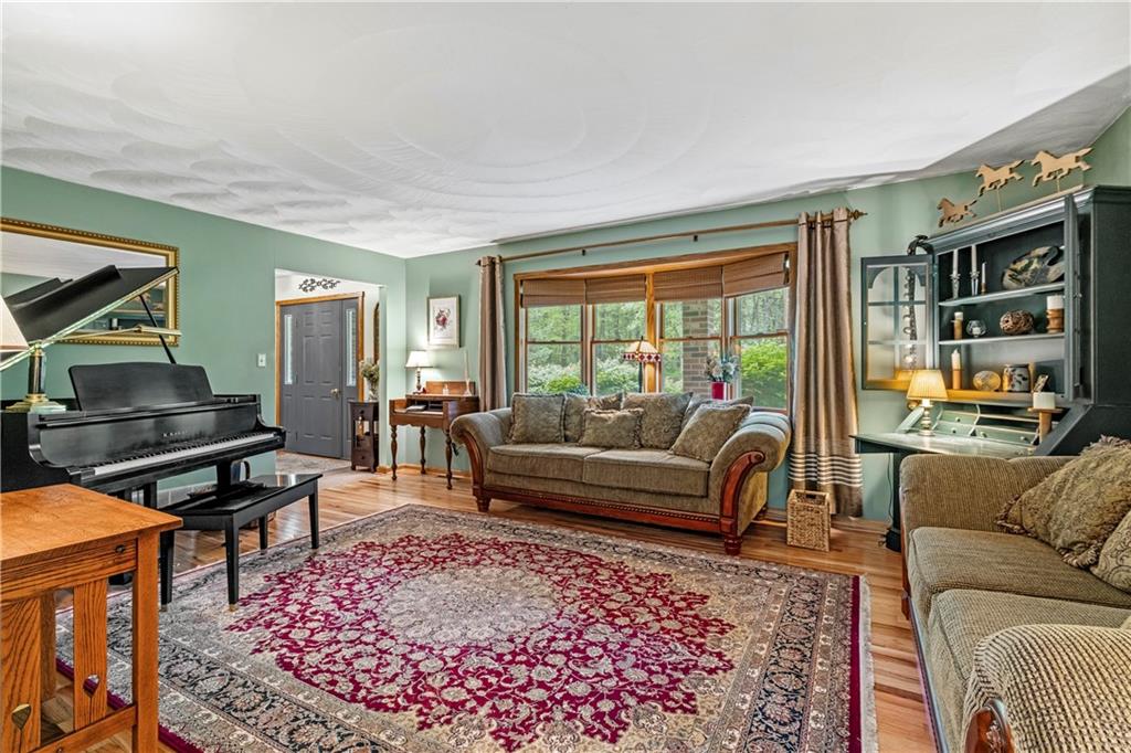 952 Bush Road New Alexandria, PA 15670 - Photo 4 of 50 Stunning bay window brings in the light, open and spacious room for entertaining or relaxing.