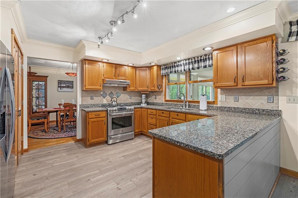 952 Bush Road New Alexandria, PA 15670 - Photo 5 of 50 Plenty of space for all your culinary needs!! Beautiful Shiplap on outside of Island/Counter.