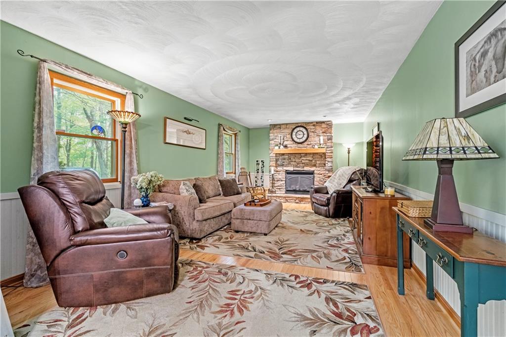 952 Bush Road New Alexandria, PA 15670 - Photo 7 of 50 Huge and open family room with gorgeous Stone Gas Fireplace.