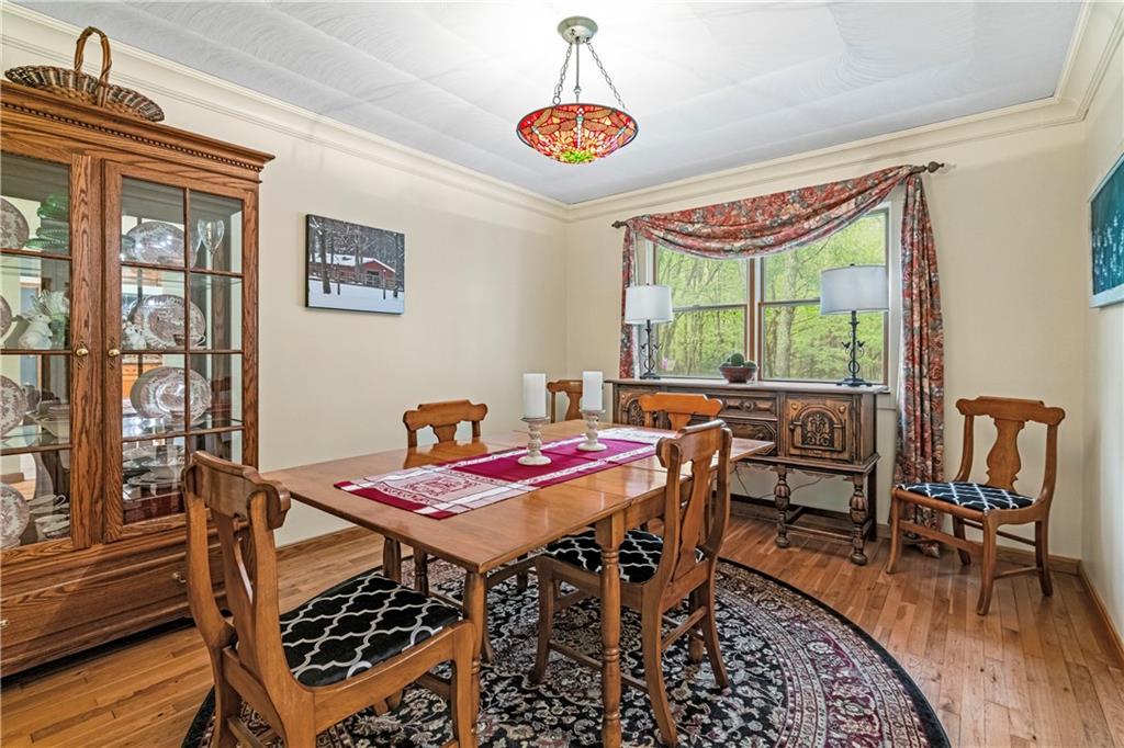 952 Bush Road New Alexandria, PA 15670 - Photo 9 of 50 Gorgeous Hardwood floors and Tray ceiling! Beautiful View Outdoors!!