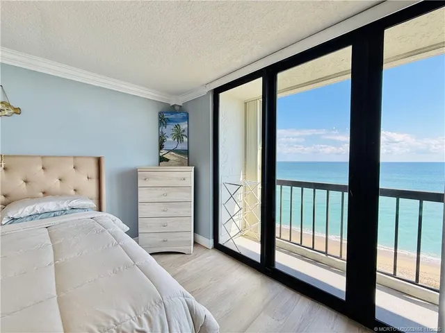 a bedroom with a bed and a closet