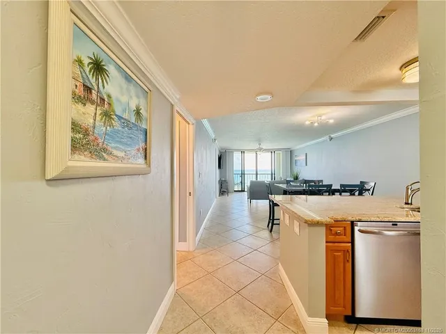 a kitchen with stainless steel appliances granite countertop a stove and a sink