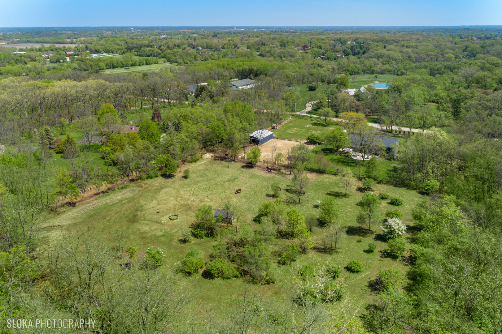 3411 Oak Ridge Road Woodstock, IL 60098 - Photo 54 of 57 a view of a forest with a street