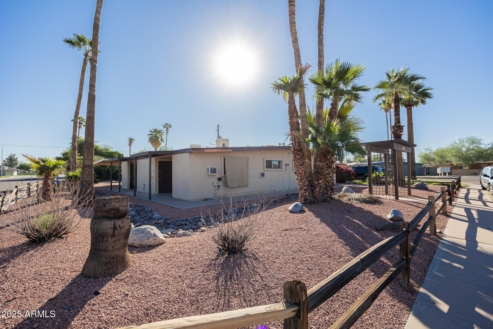 903 South Kenwood Circle, Unit 1 Tempe, AZ 85281 - Photo 2 of 15 a view of a terrace with chairs