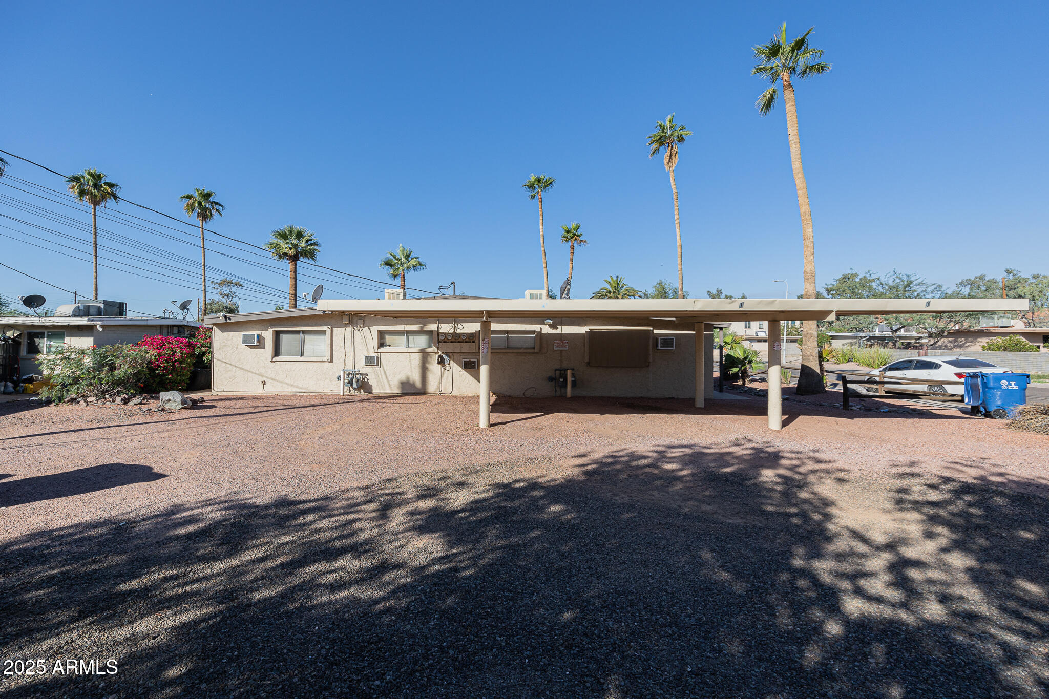 903 South Kenwood Circle, Unit 1 Tempe, AZ 85281 - Photo 3 of 15 a view of a street with cars
