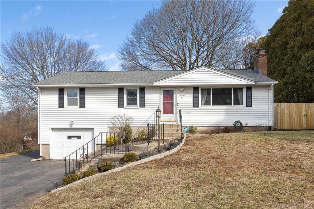 75 Highridge Road Southington, CT 06489 - Photo 1 of 1 a front view of a house with garden