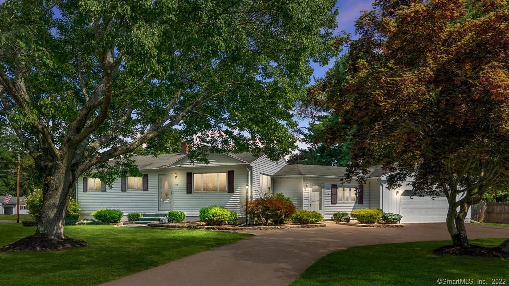 72 Ann Road South Windsor, CT 06074 - Photo 1 of 1 a front view of a house with a garden and tree