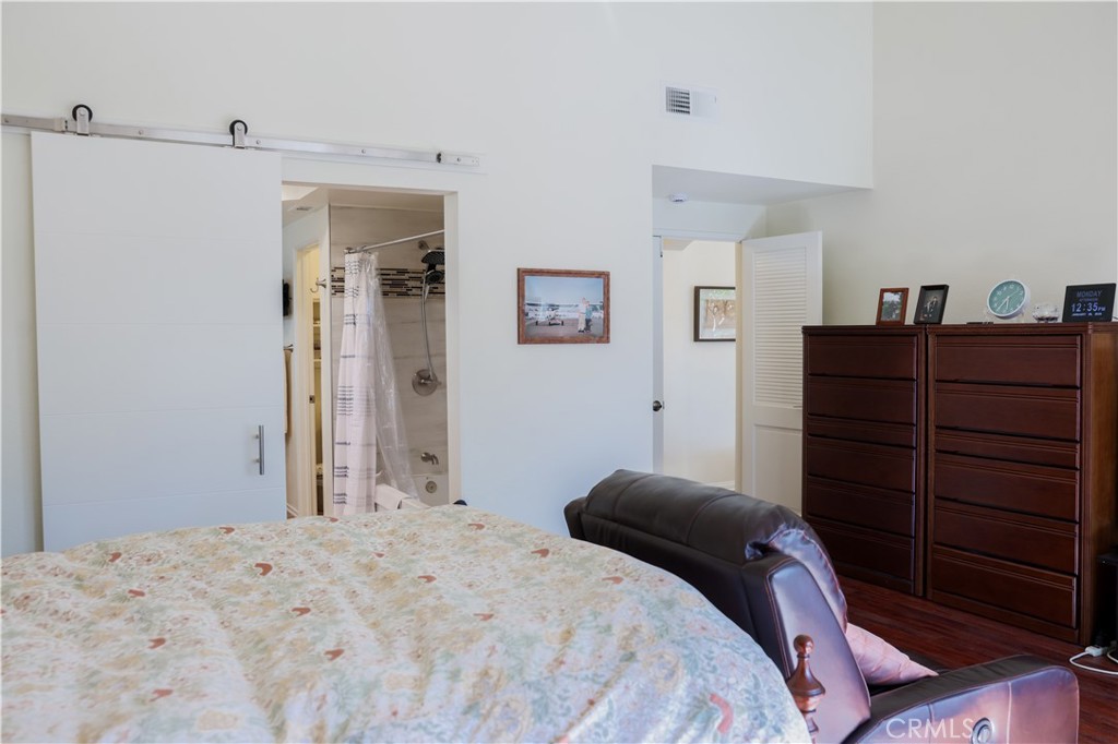 183 South Starflower Street Brea, CA 92821 - Photo 17 of 29 a bedroom with a bed and a dresser