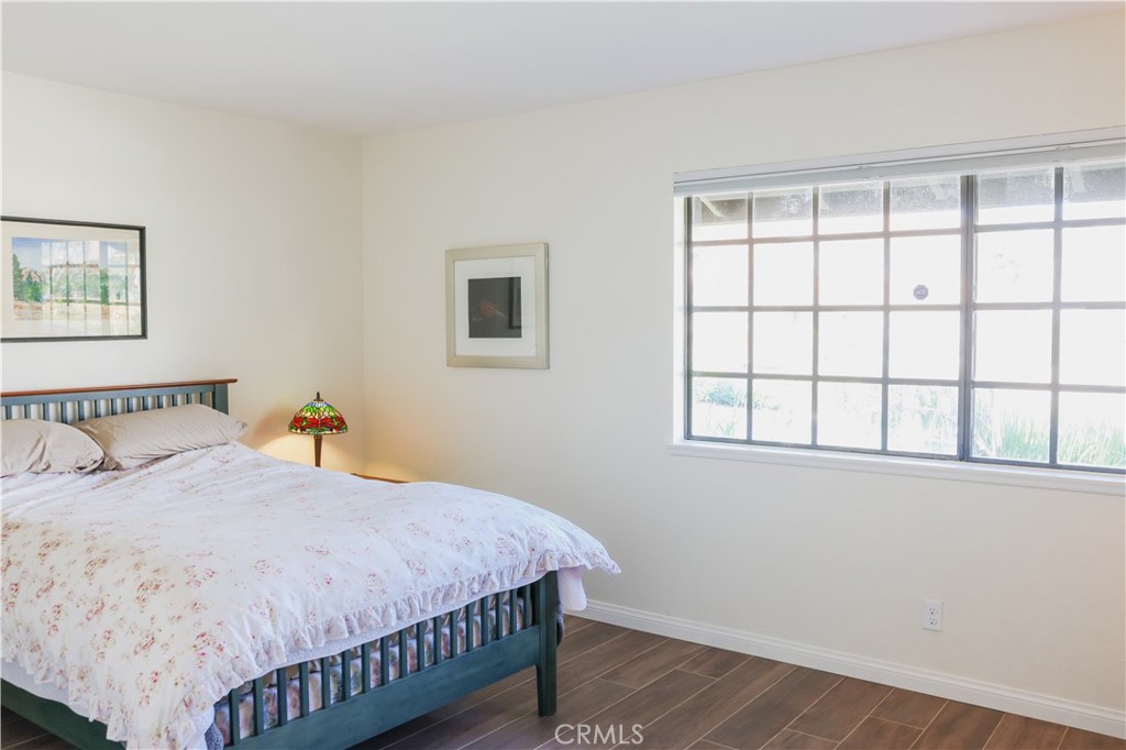 183 South Starflower Street Brea, CA 92821 - Photo 19 of 29 a bedroom with a bed and a window