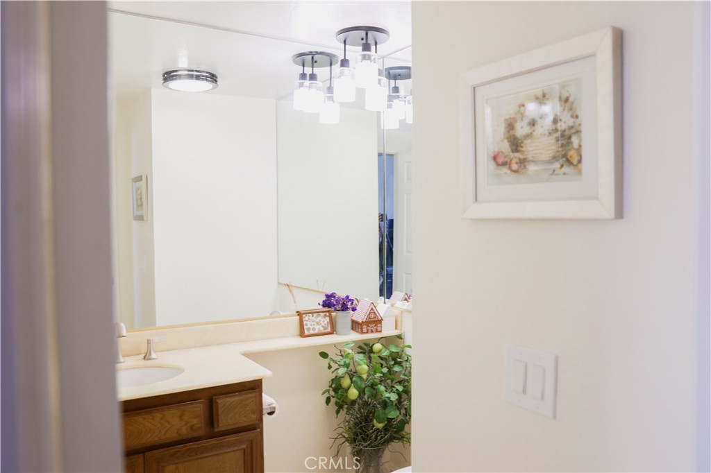 183 South Starflower Street Brea, CA 92821 - Photo 20 of 29 a bathroom with a sink and a mirror