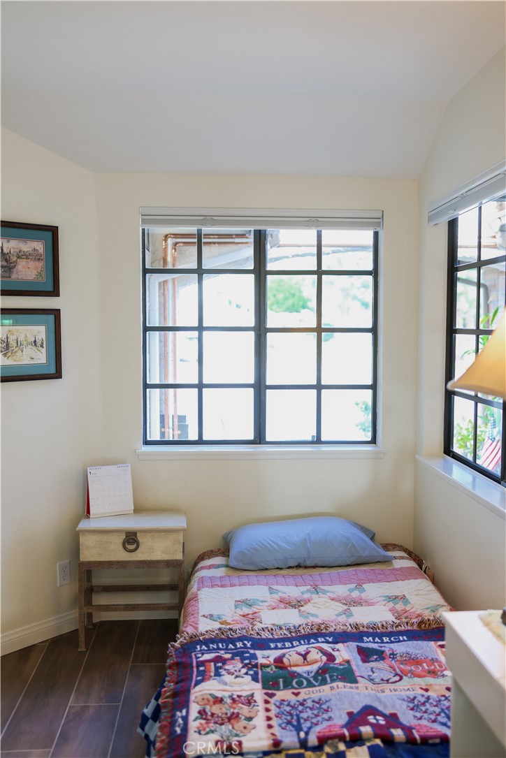 183 South Starflower Street Brea, CA 92821 - Photo 21 of 29 a bedroom with a bed and a window